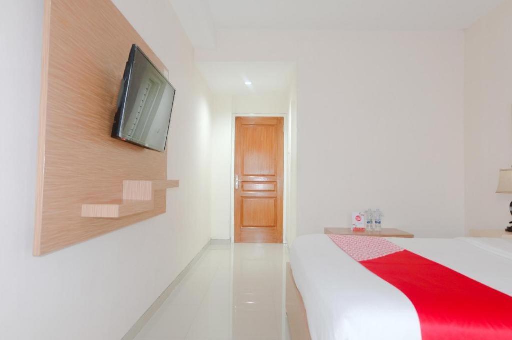מאלאנג Oyo 696 Hasanah Guest House Syariah De Saphire מראה חיצוני תמונה